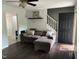 Cozy living room showcasing a comfortable sofa, modern decor, and natural light at 503 Pine Run, Knightdale, NC 27545