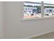 Bright, airy room with a window showcasing new homes under construction at 510 Resteasy Dr, Apex, NC 27539