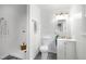 Bright bathroom features a walk-in shower, vanity, and stylish decor at 5121 Raintree Rd, Durham, NC 27712