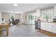 Open-concept floorplan seamlessly integrates the dining room and kitchen at 5121 Raintree Rd, Durham, NC 27712