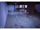 Spacious unfinished basement with exposed ceiling, brick column, and concrete flooring at 515 Wildwood Dr, Durham, NC 27712