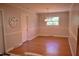 Dining room with hardwood floors, neutral paint, and a chandelier at 515 Wildwood Dr, Durham, NC 27712