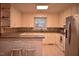 Kitchen featuring granite countertops, white cabinets and stainless steel appliances at 515 Wildwood Dr, Durham, NC 27712