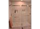 Modern shower with gray tile and glass doors, offering a luxurious and sleek design at 515 Wildwood Dr, Durham, NC 27712