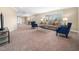 Finished basement with plush carpeting, recessed lighting, and ample space for relaxing and entertaining at 5200 Pulley Town Rd, Zebulon, NC 27597