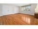 Bright bedroom boasts hardwood floors, two closets and a window with blinds at 5200 Pulley Town Rd, Zebulon, NC 27597