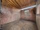 Interior view of a horse stall with plywood walls and a small window for ventilation at 5200 Pulley Town Rd, Zebulon, NC 27597