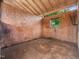 Clean horse stall with simple design, plywood walls, and an elevated hay rack at 5200 Pulley Town Rd, Zebulon, NC 27597