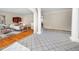 Elegant living room featuring hardwood floors, decorative columns, and open layout, great for gatherings at 5200 Pulley Town Rd, Zebulon, NC 27597
