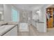 Spacious bathroom with a walk-in shower, soaking tub, and double vanity at 5805 Bayberry Ln, Raleigh, NC 27612