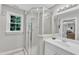 Shower room features a corner glass shower and natural light at 5805 Bayberry Ln, Raleigh, NC 27612