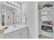 Bathroom with ample storage shelves and a towel rack at 5805 Bayberry Ln, Raleigh, NC 27612