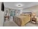 Cozy bedroom with natural light, a decorative ceiling fixture, and neutral walls at 5805 Bayberry Ln, Raleigh, NC 27612