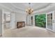 Large main bedroom features an outdoor balcony with wooded views at 5805 Bayberry Ln, Raleigh, NC 27612