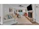 Inviting living room features a brick fireplace, ceiling fan and hardwood floors at 5805 Bayberry Ln, Raleigh, NC 27612