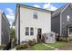 Backyard with an enclosed yard, a small shed, and green space at 586 Great Ridge Pkwy, Chapel Hill, NC 27517