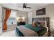 Bedroom with a bed, plaid headboard, and a tractor picture on the wall at 586 Great Ridge Pkwy, Chapel Hill, NC 27517
