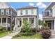 Charming two-story home with a welcoming front porch and lush landscaping at 586 Great Ridge Pkwy, Chapel Hill, NC 27517