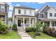 Charming two-story home featuring a welcoming front porch, landscaped yard, and inviting curb appeal at 586 Great Ridge Pkwy, Chapel Hill, NC 27517