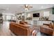 Open-concept living space with modern finishes, sleek lighting, and a seamless flow into the kitchen area at 586 Great Ridge Pkwy, Chapel Hill, NC 27517