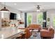 Inviting living area featuring comfortable seating, natural light, and stylish decor, creating a cozy atmosphere at 586 Great Ridge Pkwy, Chapel Hill, NC 27517