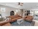 Open-concept living space with modern finishes, sleek lighting, and a seamless flow into the kitchen area at 586 Great Ridge Pkwy, Chapel Hill, NC 27517