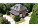 An aerial view showcasing the traditional style of this charming brick home at 6217 Battleford Dr, Raleigh, NC 27612