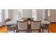 Dining room with ample seating, natural light, and traditional finishes at 6217 Battleford Dr, Raleigh, NC 27612