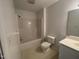 Functional bathroom featuring a bathtub, toilet, and vanity with a sink at 65 Opie Frazier Rd, Henderson, NC 27537