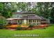 A spacious deck area that is ideal for relaxation and entertaining, with seamless indoor-outdoor living at 69 Margaret Pl, Chapel Hill, NC 27516