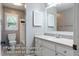Well-lit bathroom with a vanity, neutral tones, and a shower with updated fixtures for a modern look at 69 Margaret Pl, Chapel Hill, NC 27516