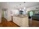 Open kitchen design with bar seating, granite countertops, and stainless steel appliances, perfect for entertaining at 69 Margaret Pl, Chapel Hill, NC 27516