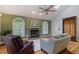 Living room features a fireplace, and architectural windows that fill the home with natural light at 69 Margaret Pl, Chapel Hill, NC 27516
