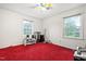 This is a bedroom with two large windows at 6909 Hickory Dr, Raleigh, NC 27603