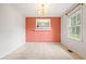 Formal dining room bathed in light from a large window at 6909 Hickory Dr, Raleigh, NC 27603