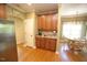 Spacious kitchen with stainless steel appliances, granite countertops and adjacent breakfast nook at 70 Glen Oaks Drive Dr, Youngsville, NC 27596