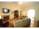 Bright living room features vaulted ceilings, fireplace, hardwood floors, and a traditional open layout at 70 Glen Oaks Drive Dr, Youngsville, NC 27596
