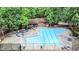 Aerial view of the community pool and amenities surrounded by lush greenery at 73 Stoneridge Rd, Durham, NC 27705
