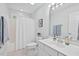 Bathroom with a single sink vanity and shower-tub combination at 7811 Still Crossing Rd, Chapel Hill, NC 27516
