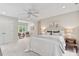 Bedroom with neutral walls and carpet, ceiling fan, and plenty of natural light at 7811 Still Crossing Rd, Chapel Hill, NC 27516