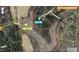 Property map showing land details, boundaries, and conservation area for the surrounding area at 7811 Still Crossing Rd, Chapel Hill, NC 27516