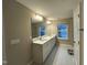 Bathroom featuring a shower and double vanity at 803 Courting St, Apex, NC 27523