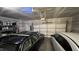 Spacious two-car garage with ample storage space and an automatic door opener, providing secure parking at 803 Courting St, Apex, NC 27523