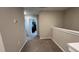 Hallway features neutral colored walls, carpet, and white doors at 803 Courting St, Apex, NC 27523