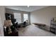 Office space features neutral carpet, windows and desk at 803 Courting St, Apex, NC 27523