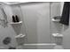 Shower featuring built-in shelving for toiletries at 803 Courting St, Apex, NC 27523