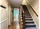 Inviting foyer boasts hardwood floors, staircase, and access to various rooms at 8620 Brookdale Dr, Raleigh, NC 27613