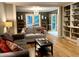 Open living room with built-in shelving and natural light at 8620 Brookdale Dr, Raleigh, NC 27613
