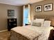 Bedroom featuring neutral tones, a comfortable bed, hardwood floors and natural light at 8620 Brookdale Dr, Raleigh, NC 27613