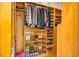 Walk-in closet with custom shelves, hanging space, and shoe storage at 8821 Oconee Ct, Chapel Hill, NC 27516
